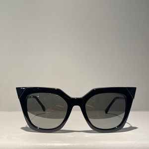 Fendi sunglasses, black with silver color accents, brand new condition.